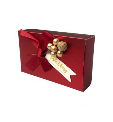 Cutie din hârtie cu fundă și floare...